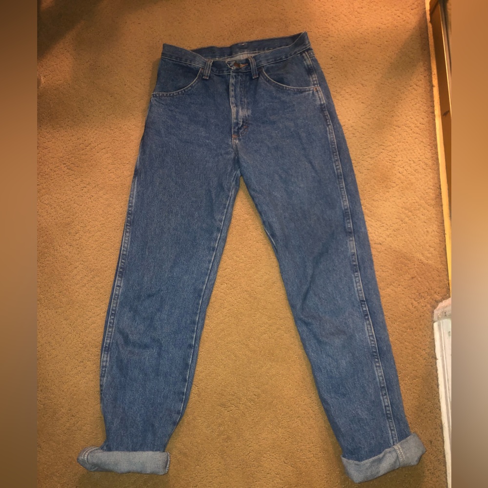 These are a darker blue rustler jeans that are high waisted